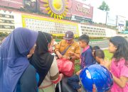 Taring Lampung Berbagi Nasi Kotak dan Takjil Gratis Berbuka Puasa di JPO Siger Milenial